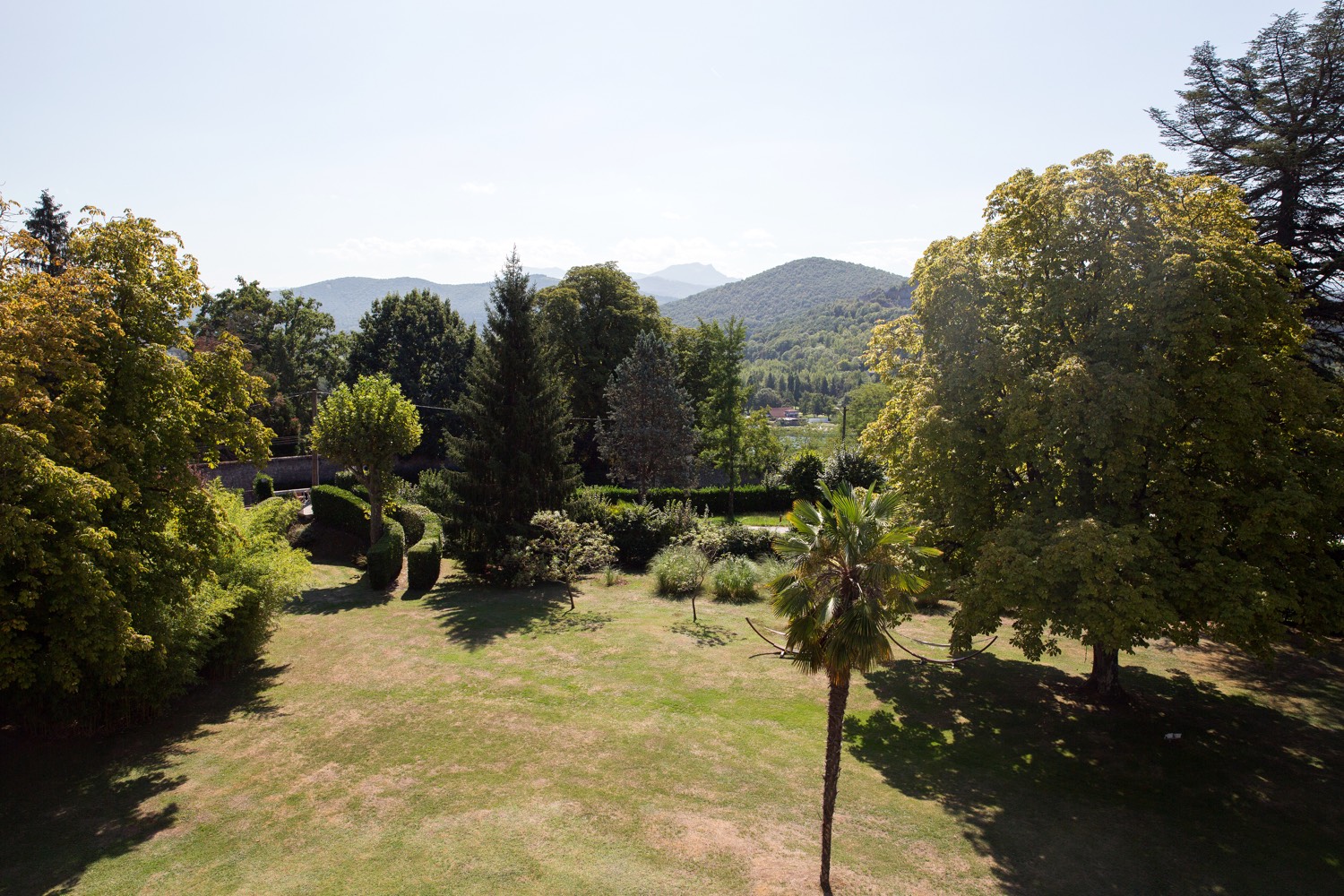 View from an upper window across the garden to the Pyrenean foothills
